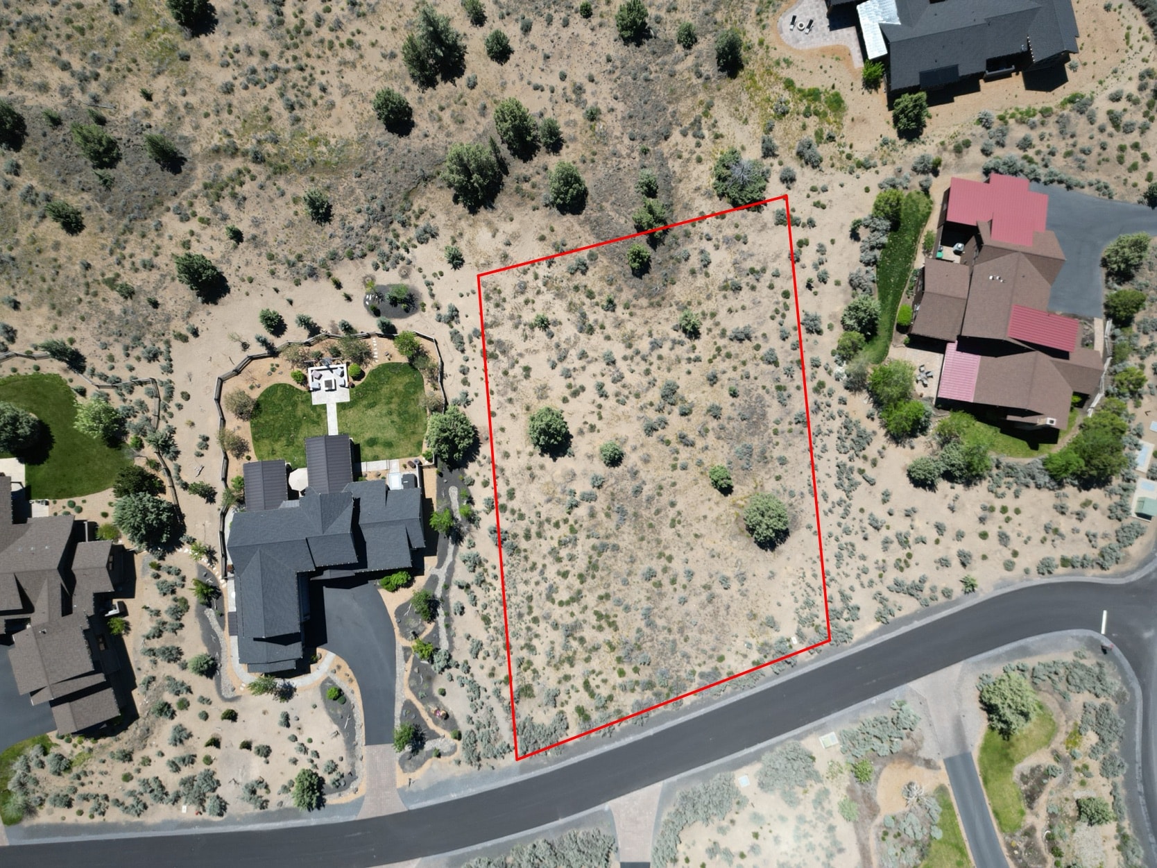 Wide aerial of luxury custom home on acreage Brasada Ranch Bend Oregon